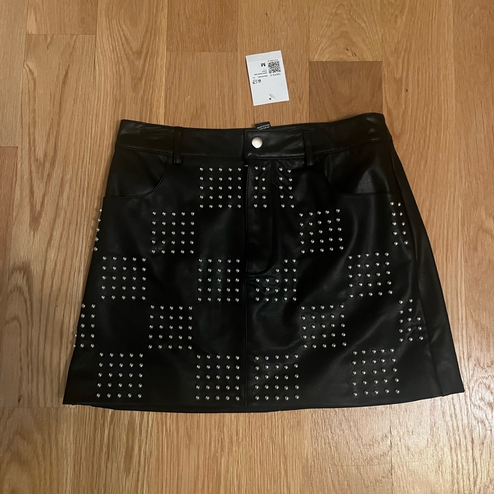 Forever 21 mini black leather skirt with silver studs